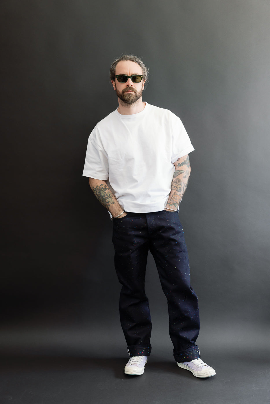 Full body front view of a male model, 5'9