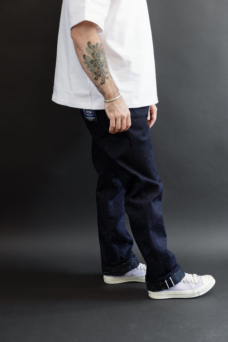 Full body side view of a male model, 5'9