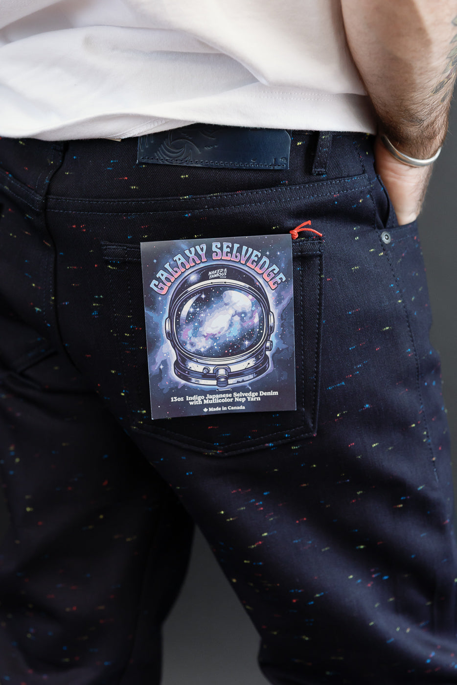 Close-up back view of Galaxy Selvedge denim on a male model, 5'9