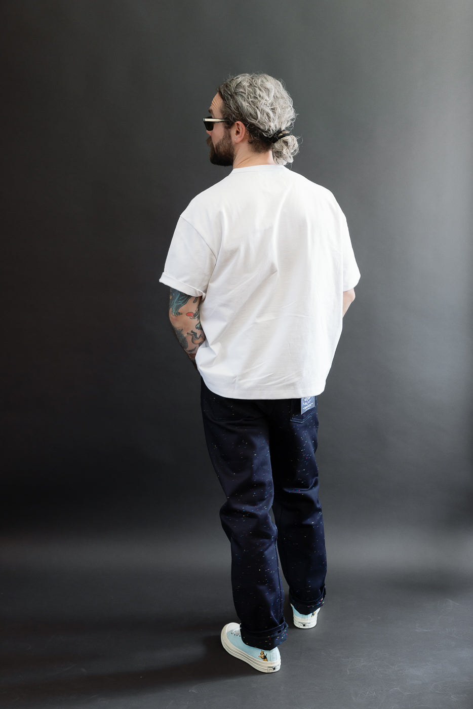 Full body back view of a male model, 5'9