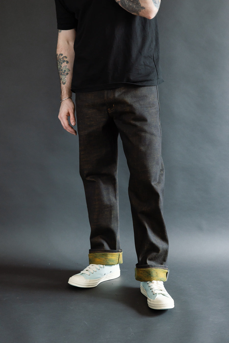 Full body front view of a male model, 5'9