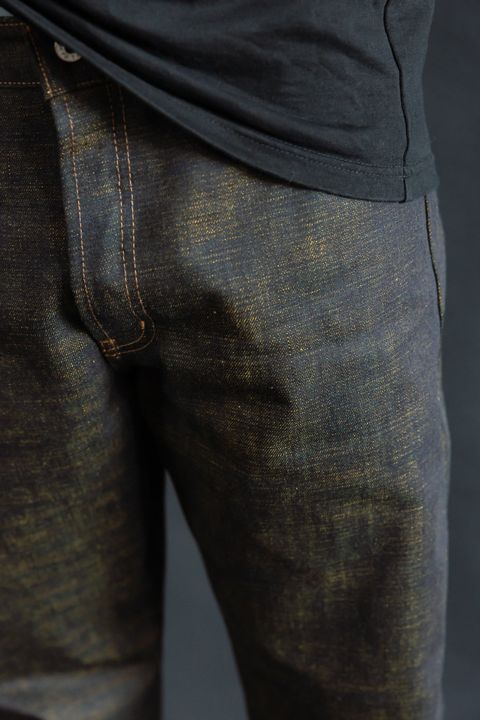 Close-up of front jeans upper thigh, yellow speckled denim, male model 5'9