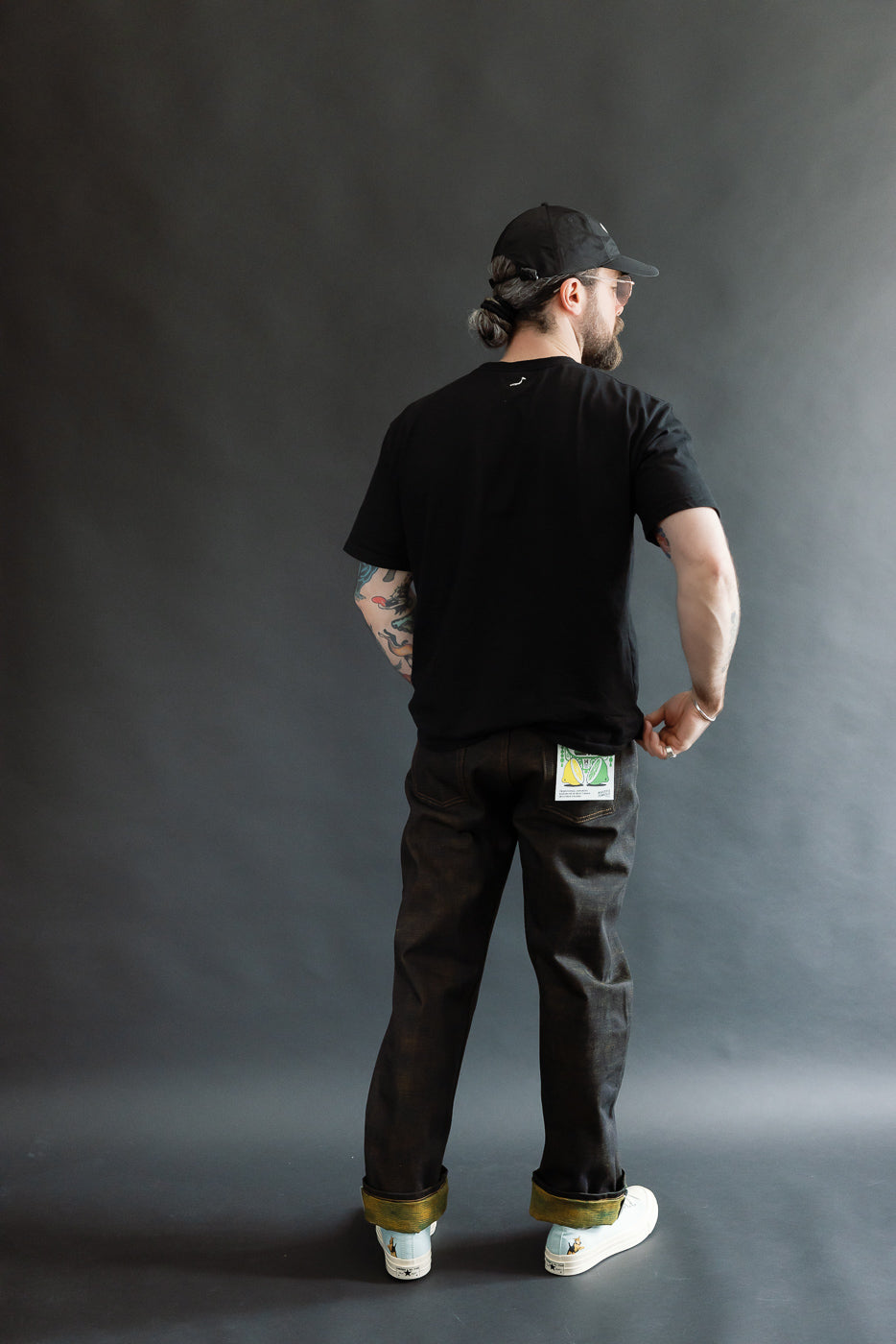 Full body rear view of male model 5'9