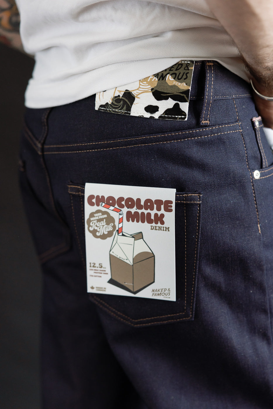 Close-up of back right side of men's selvedge denim jeans on 5'9