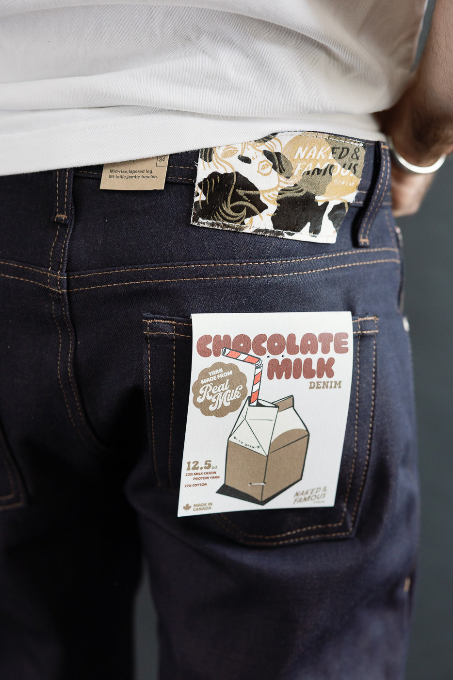 Close-up of the back side of selvedge denim jeans on a male model, 5'9