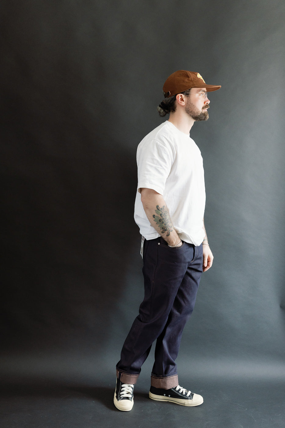 Full body side view of male model, 5'9