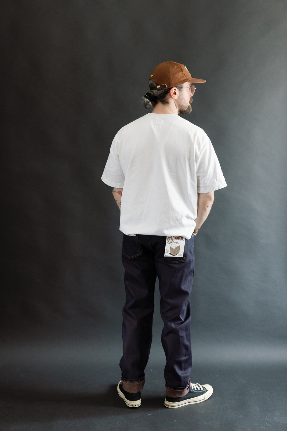 Full body rear view of male model 5'9