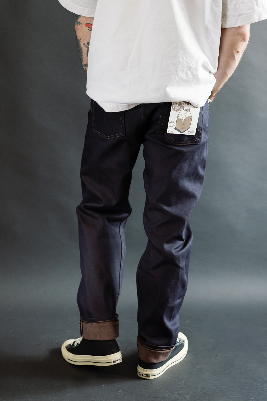 Full body rear view of male model, 5'9