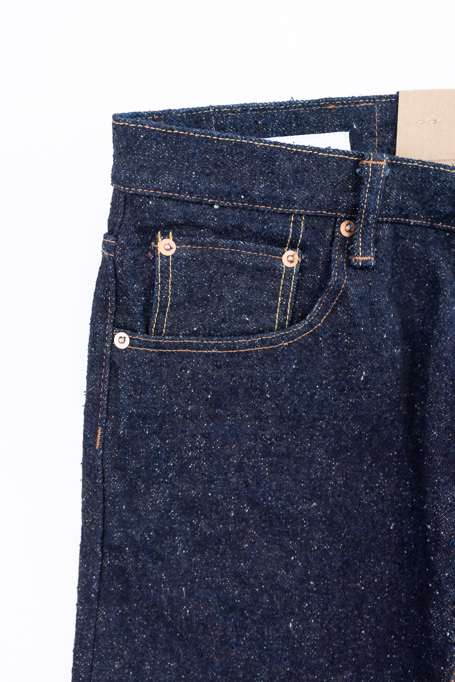 Close-up of front left hip and pocket, Naked & Famous Genseki Selvedge jeans, dark indigo denim