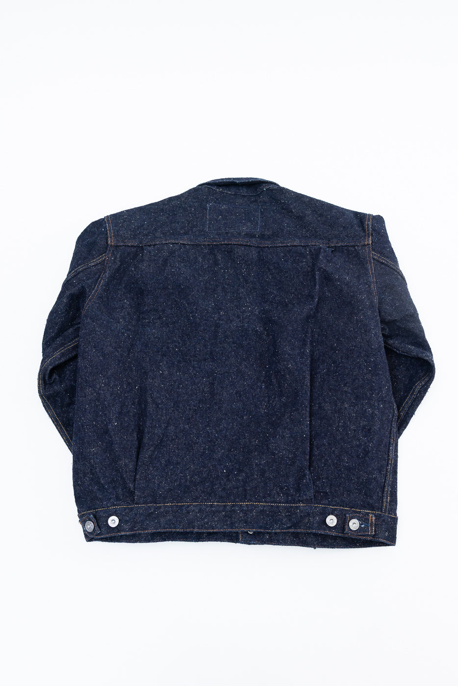 Back view flat lay of Naked & Famous Genseki Selvedge heritage denim jacket, dark indigo, at Dant