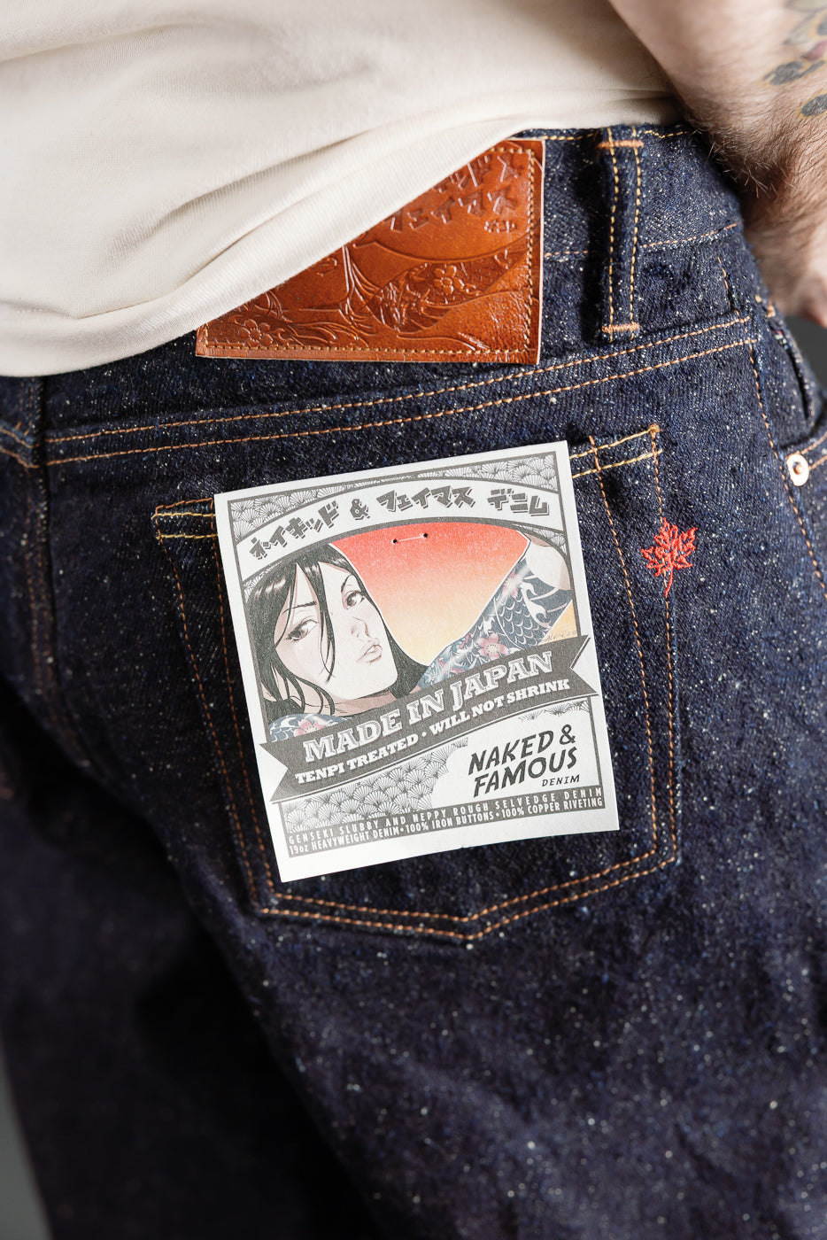 Close-up of back right side Genseki selvedge jeans on male model, 5'9