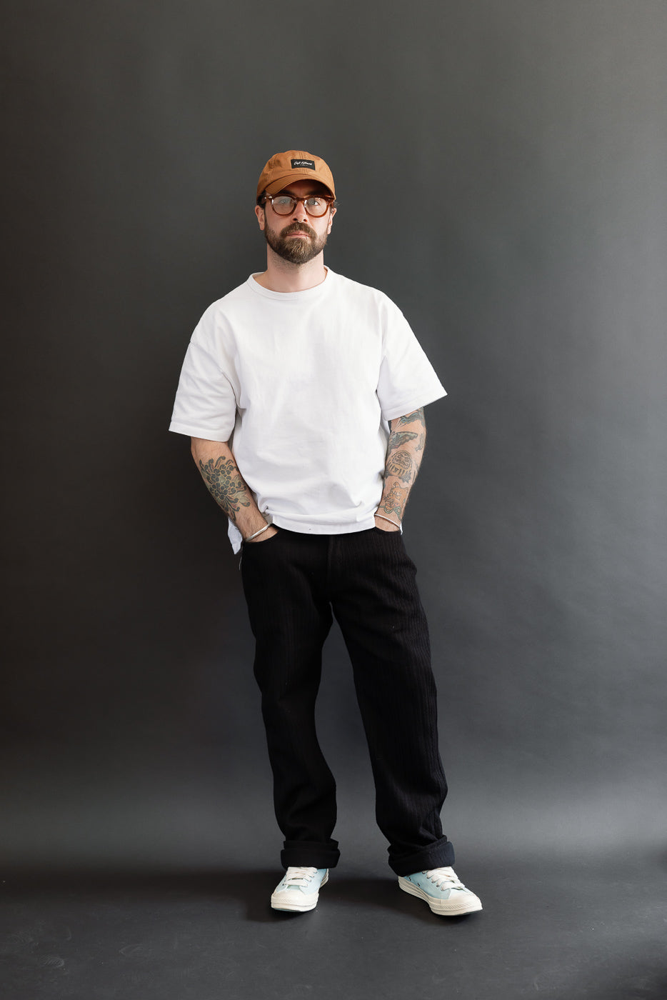 Full body front view of a male model, 5'9