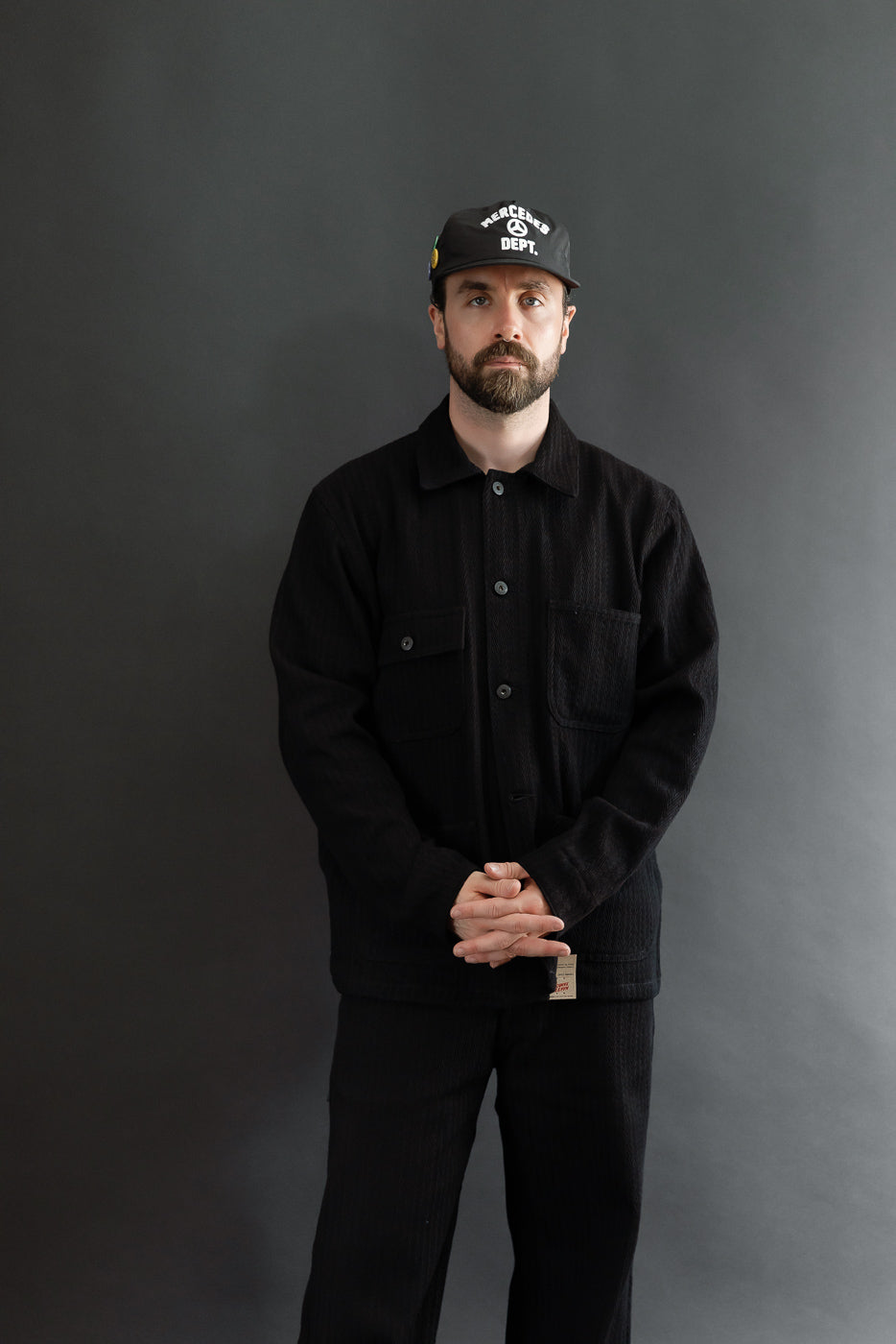 Full body front view of a male model, 5'9