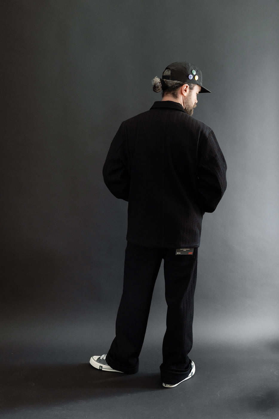 Full body back view of male model, 5'9