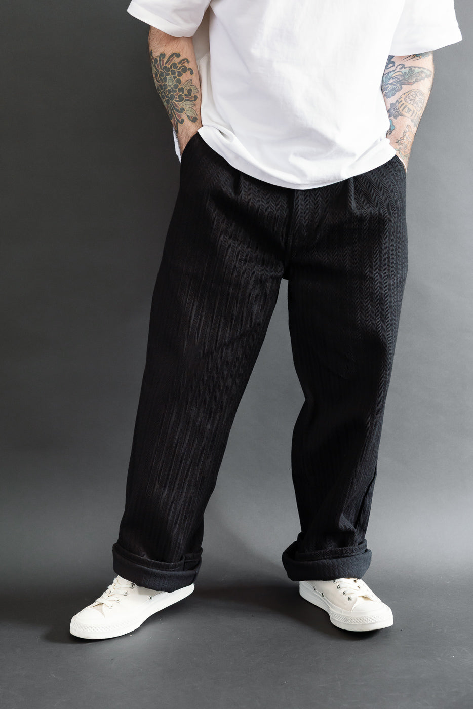 Full body front view of a male model, 5'9