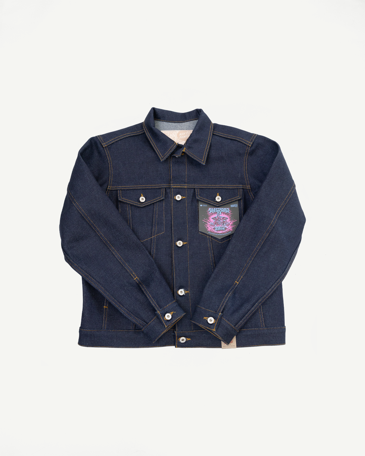 Front view flat lay of a dark blue denim jacket with contrast stitching and a chest patch.