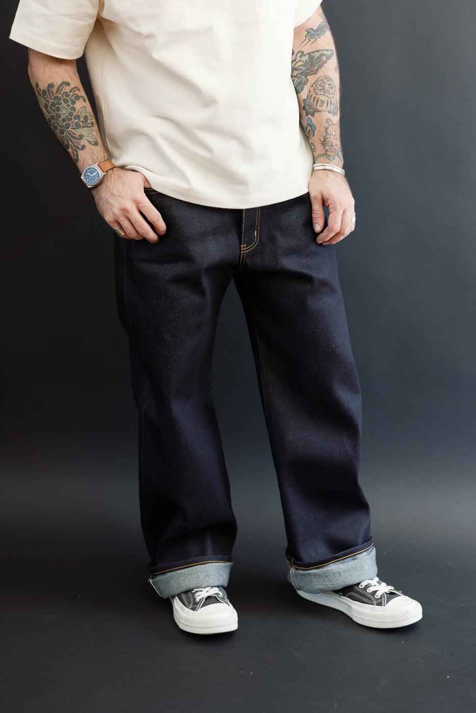 Full body front view of a male model, 5'9