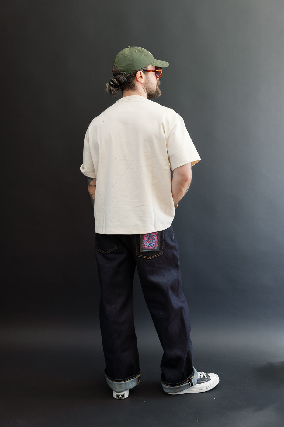 Full body back view of a male model, 5'9