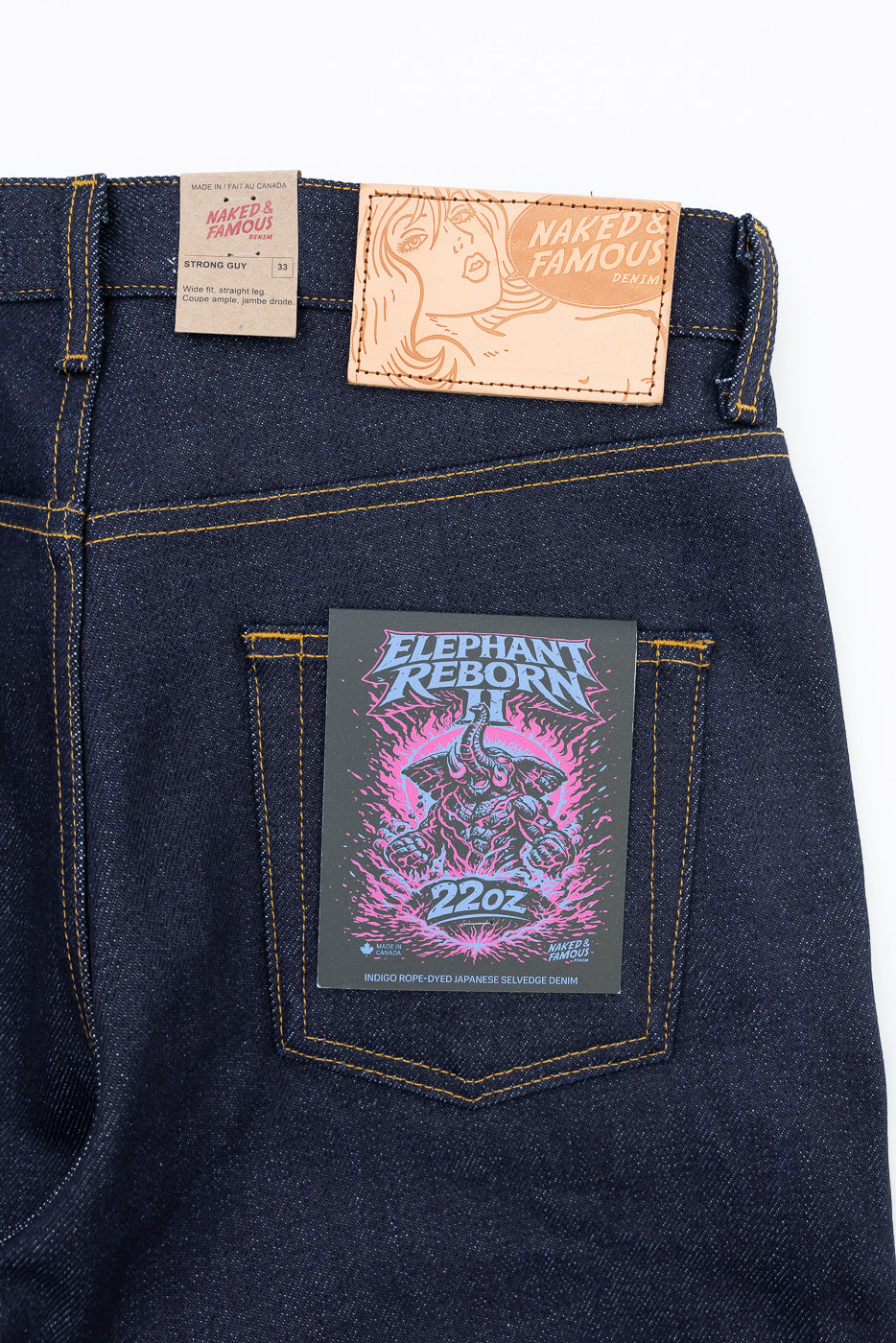 Close-up of the back of Naked & Famous 22oz denim jeans showing the waist tags and back pocket.