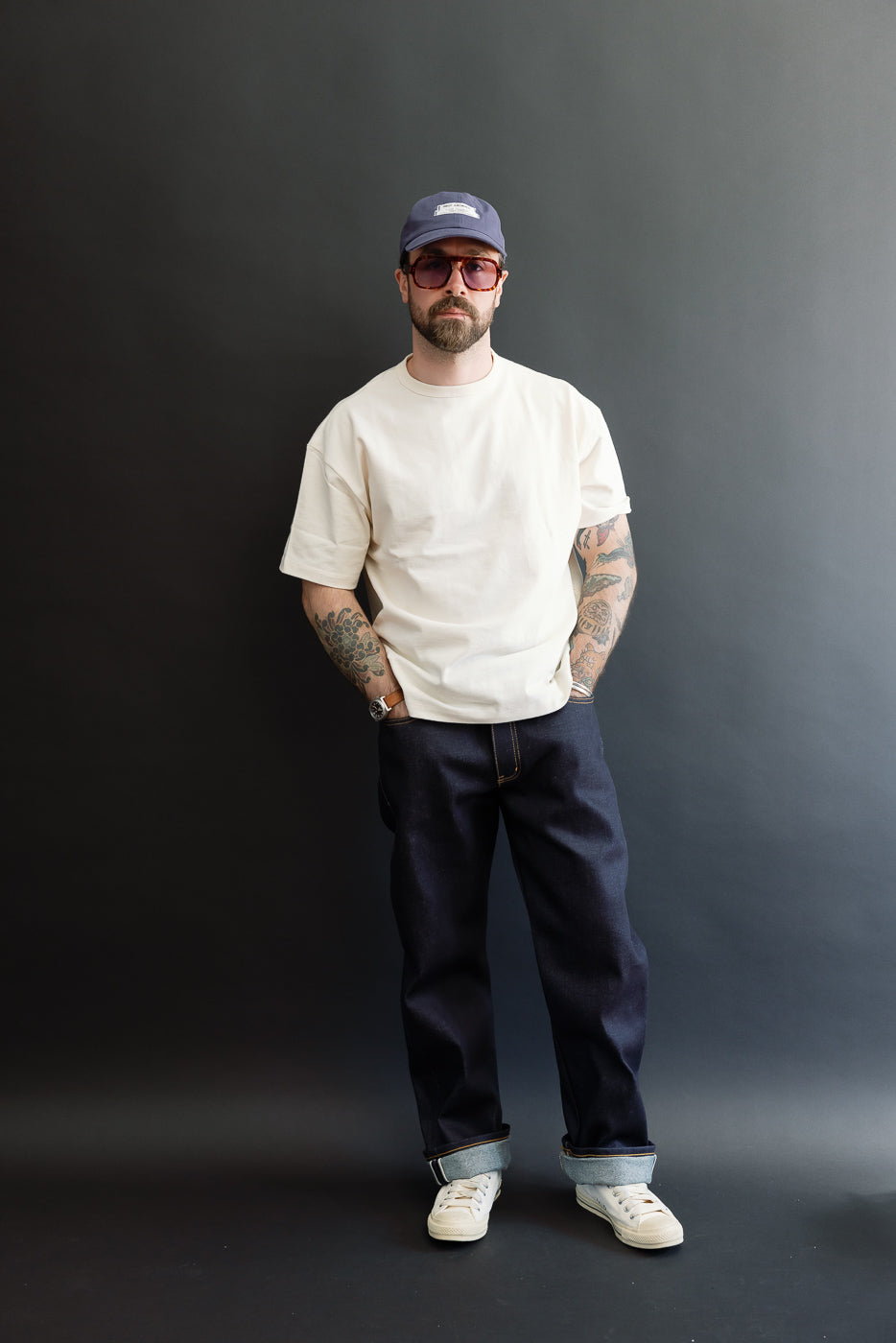 Full body front view of a male model, 5'9