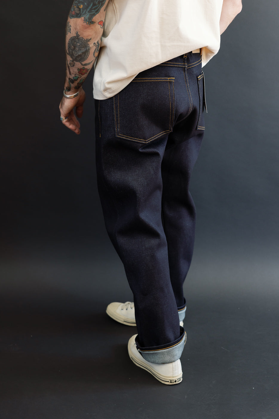 Full body back view of a male model, 5'9