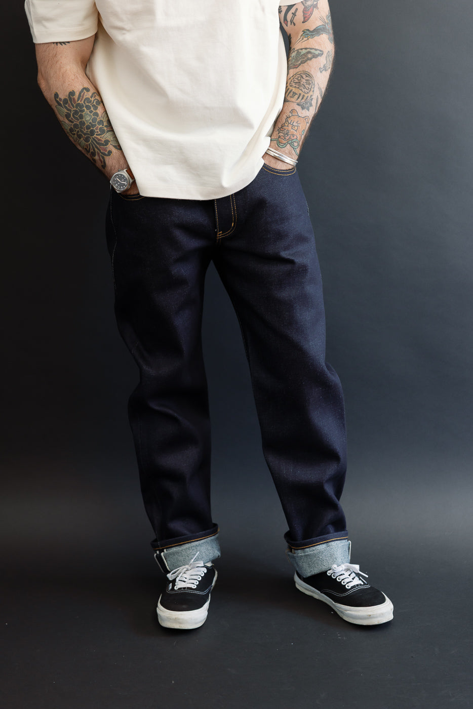 Full body front view of a male model, 5'9