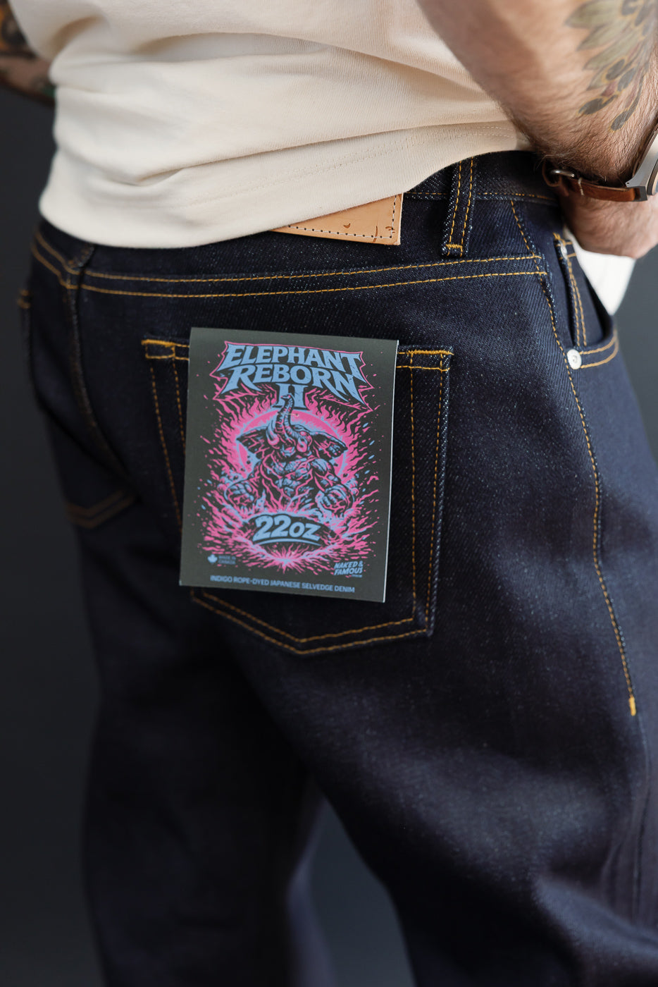Close-up back view of 22oz selvedge denim jeans on a male model, 5'9