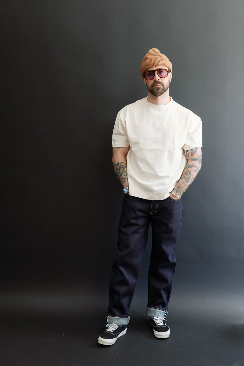 Full body front view of a male model, 5'9