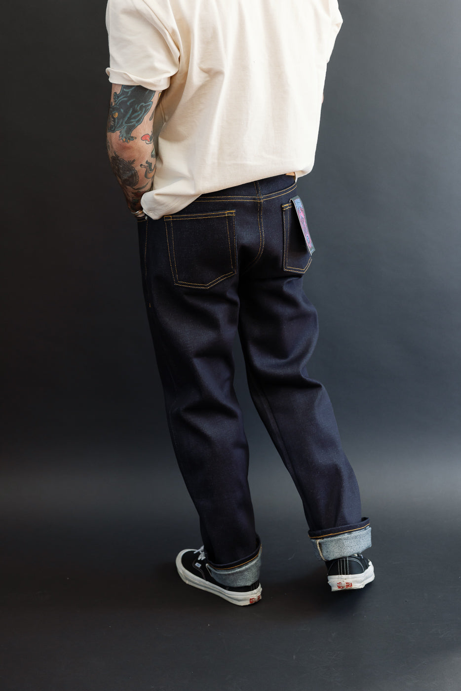 Full body back view of a male model, 5'9