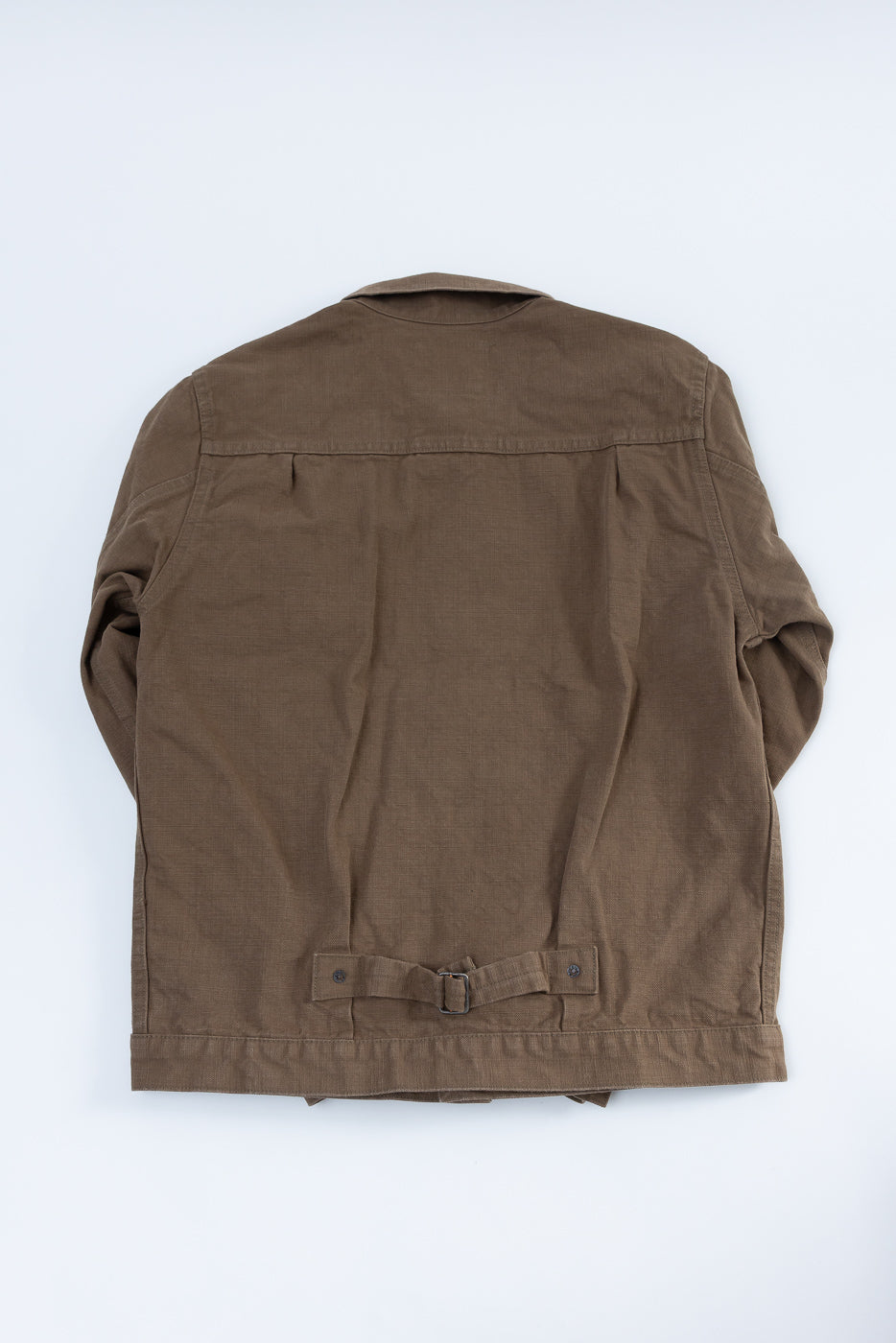 01507-HOX-BRK - 13oz Brown Khaki Sulfur Dyed Heavy Oxford Jacket - Type I, showcasing a back view with a utilitarian design, simple collar, and cinch back detail.