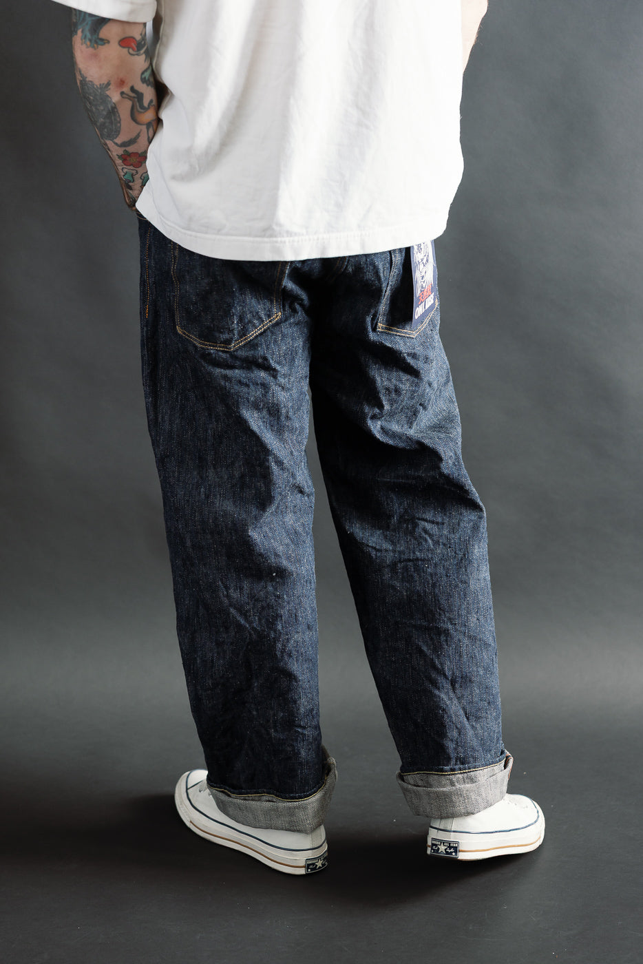 Back view close-up of male model 5'9