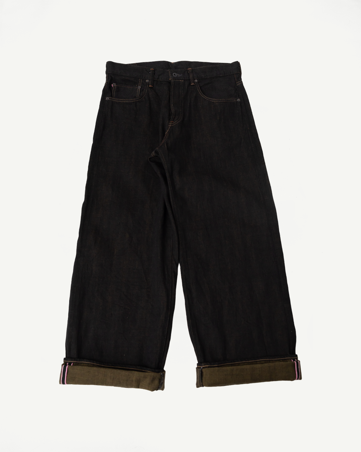 Flat lay, front view of black olive selvedge denim jeans, super wide, cuffed hems, Dant shop
