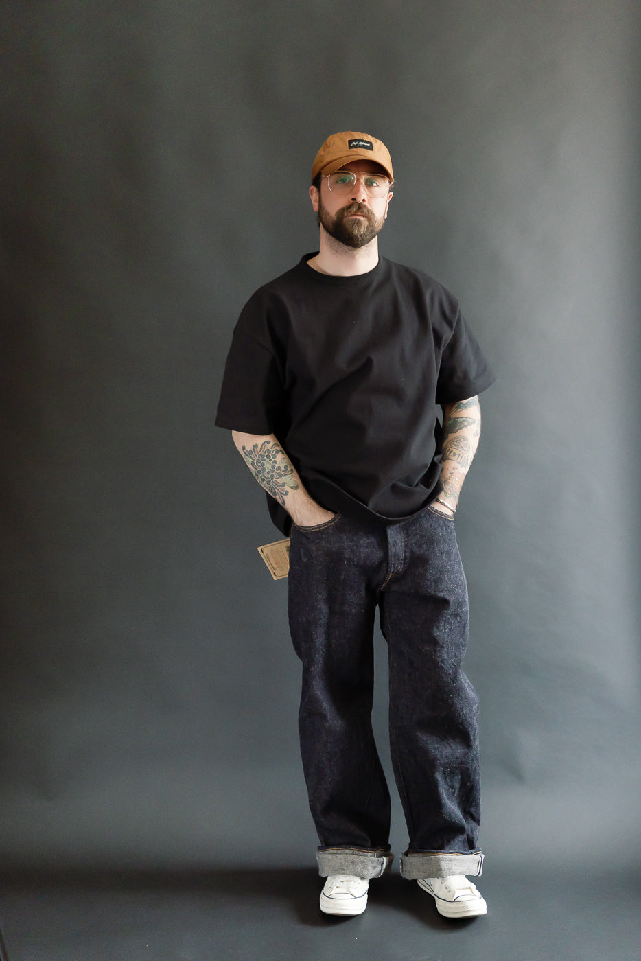 Front full-body view of male model, 5'9