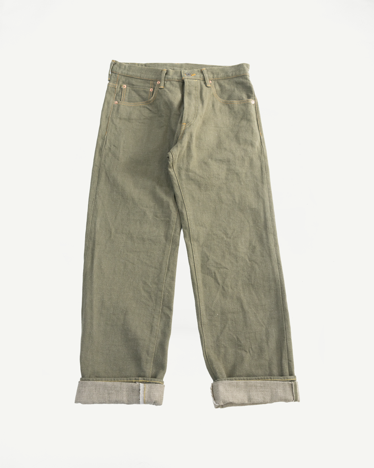 Flat lay, front view of olive selvedge denim jeans, relaxed straight leg, cuffed hem, showing pocket details.
