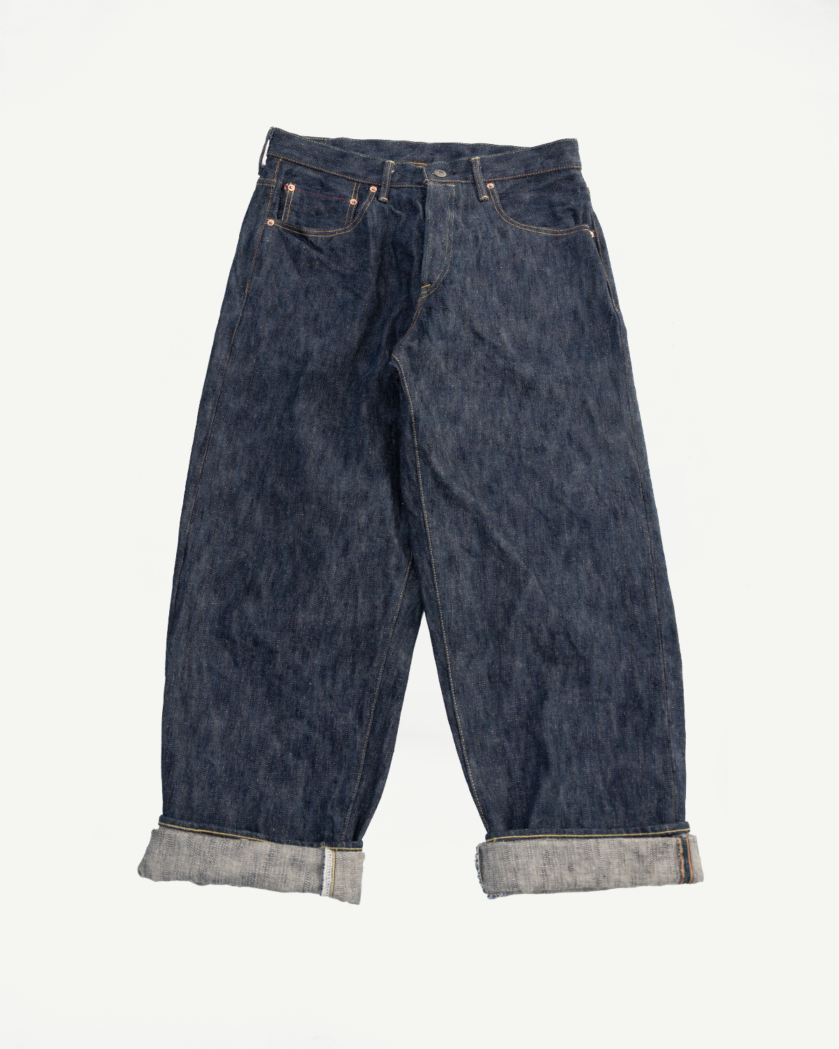 Front view flat lay of Oni 16oz Kase denim selvedge jeans, super wide tapered fit, cuffed hem