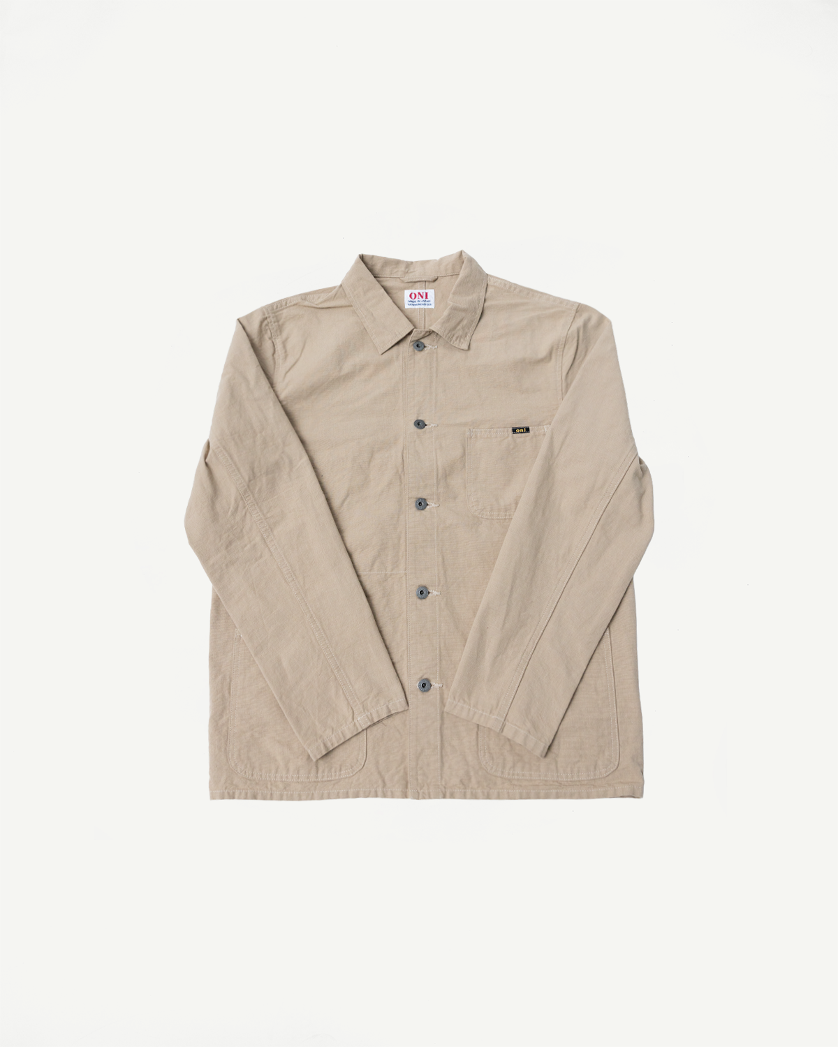 Front flat lay of beige long-sleeve shirt with button closure, chest pocket, and ONI tag