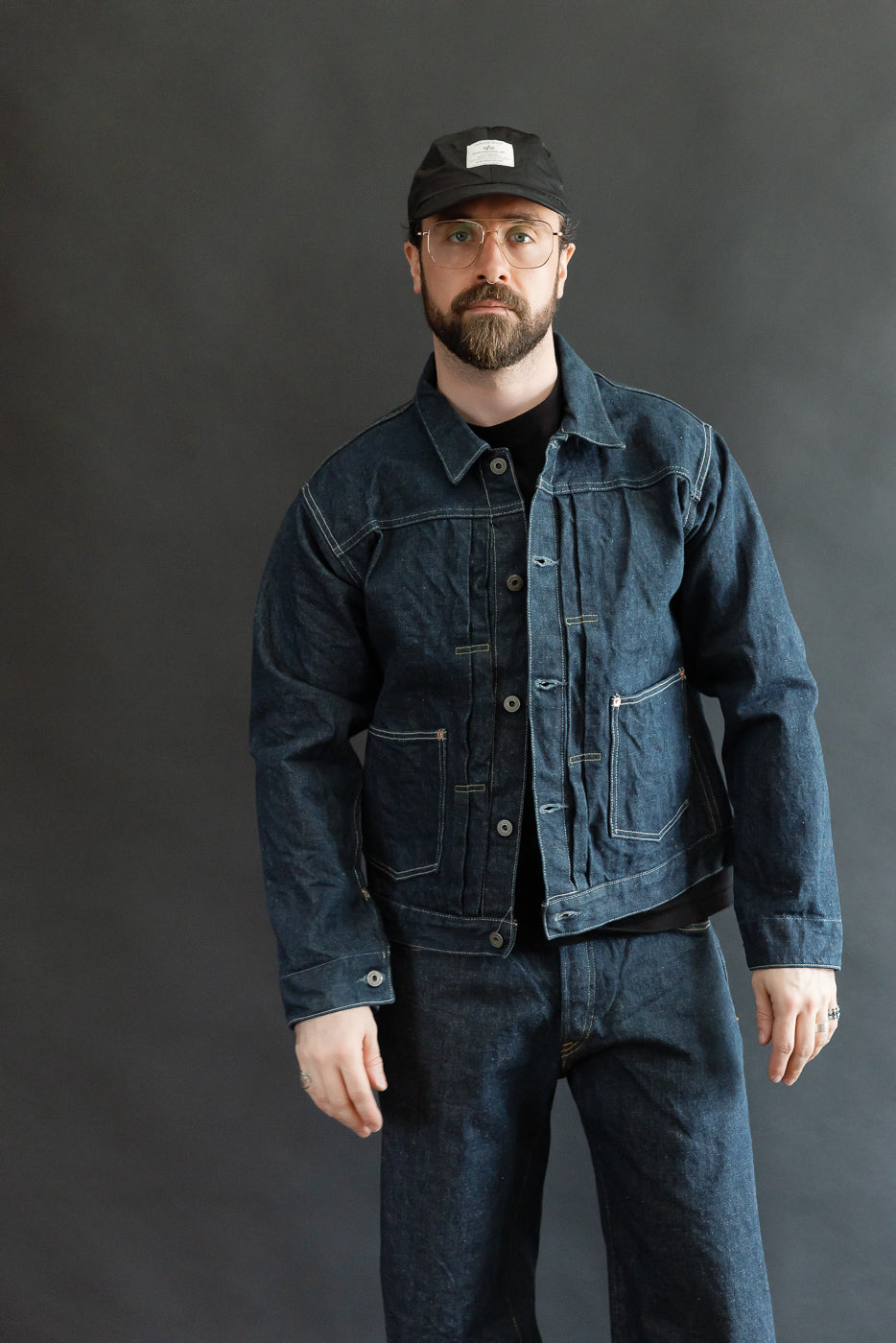 Full body front view of a male model, 5'9