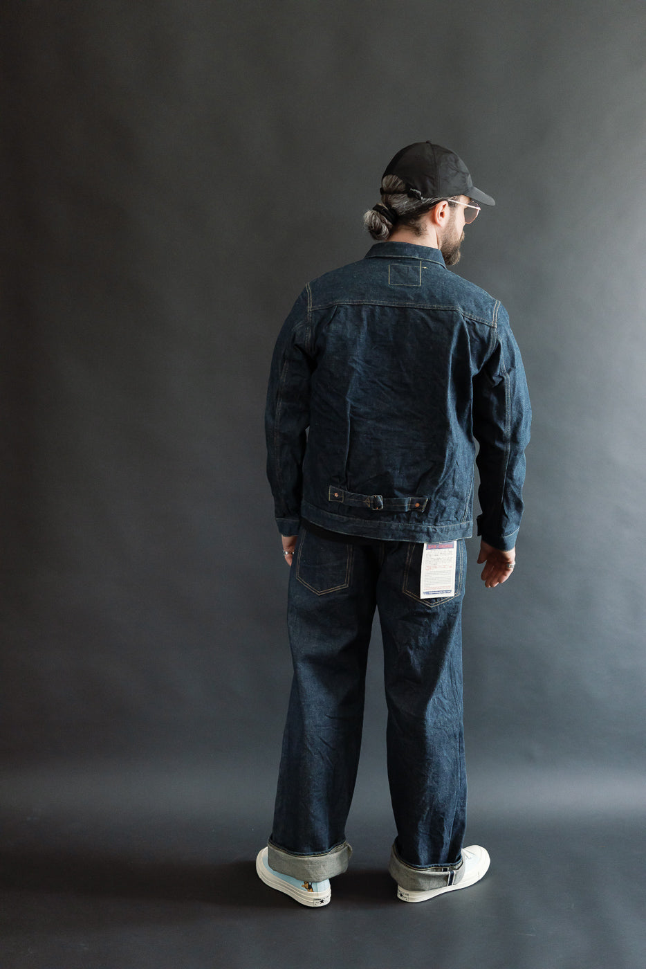 Full body rear view of male model 5'9