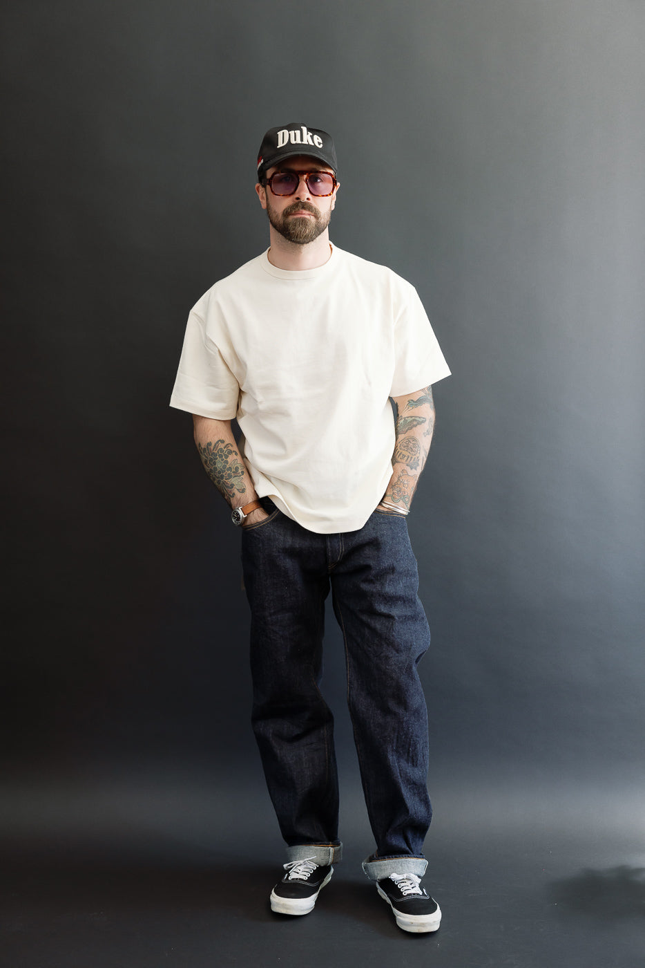 Full body front view of a male model, 5'9