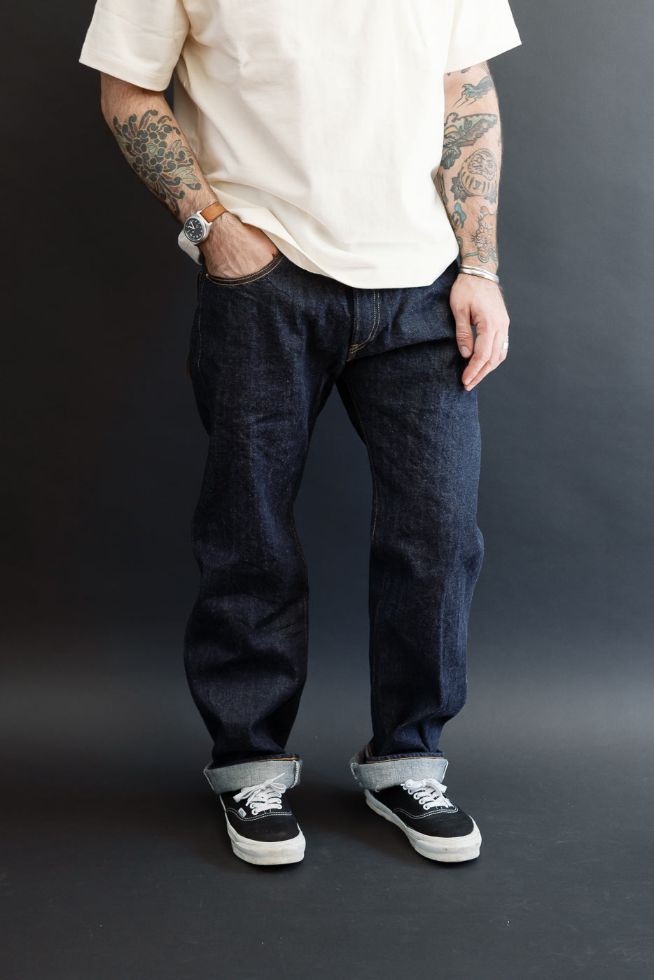 Full body front view of a male model, 5'9