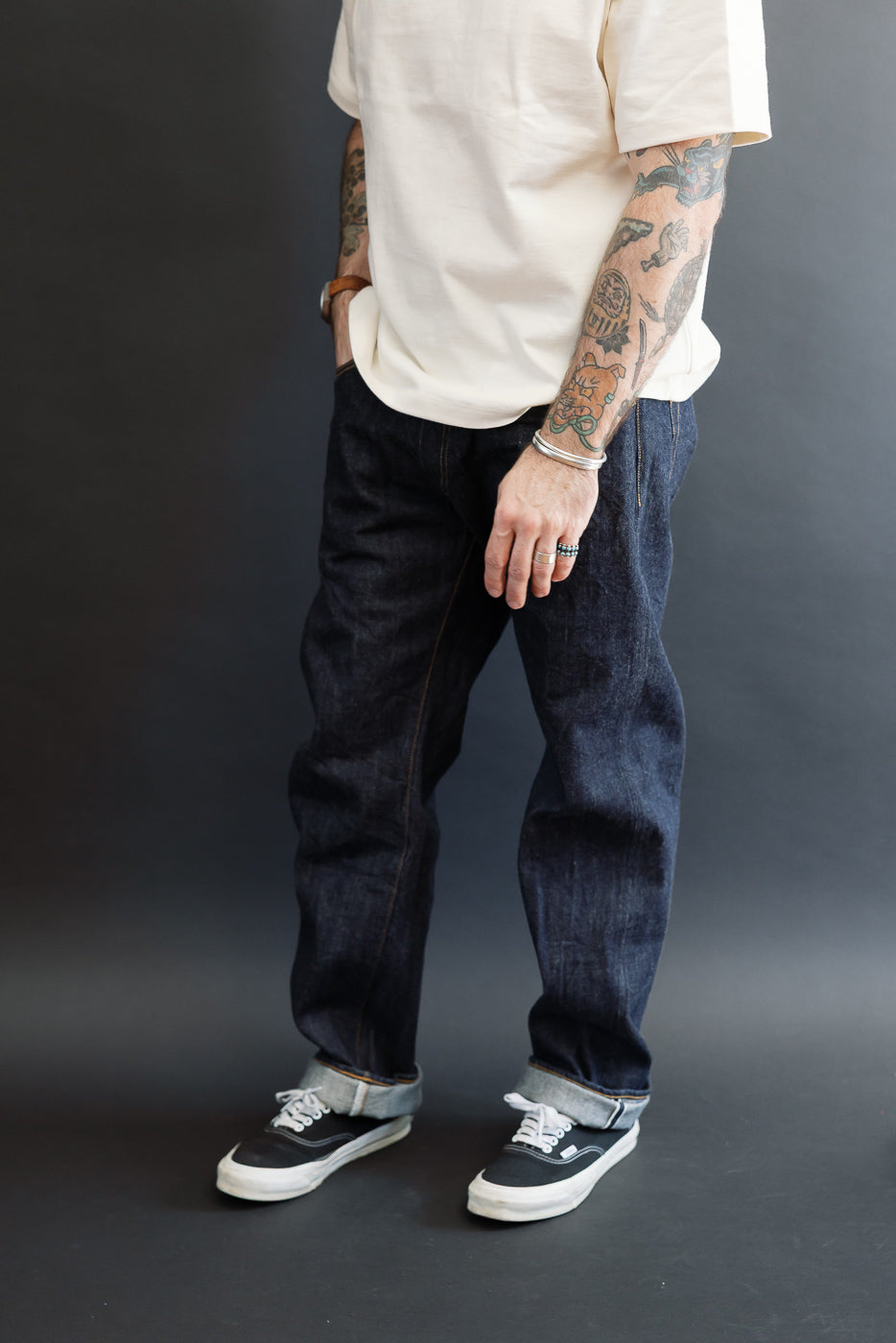 Full body front view of a male model, 5'9