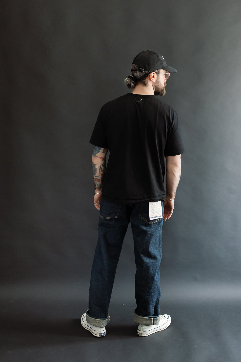 Full body back view of male model 5'9