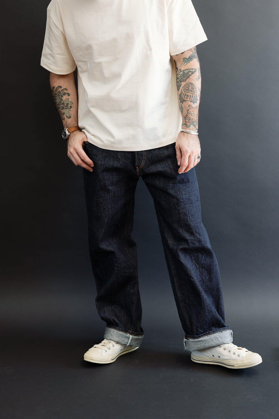 Full body front view of a male model, 5'9