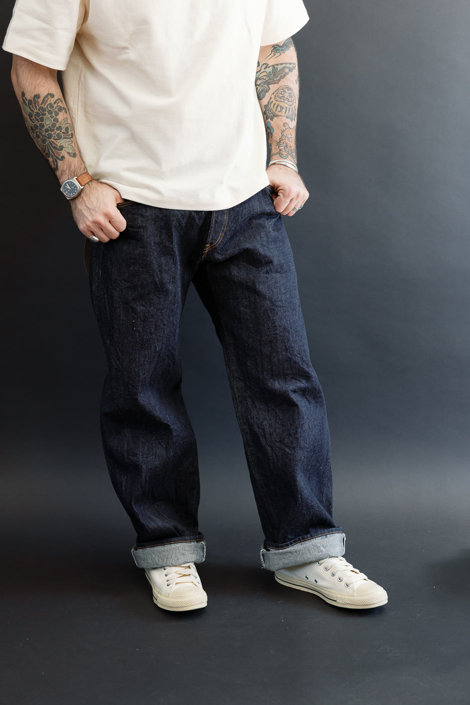 Full body front view of a male model, 5'9