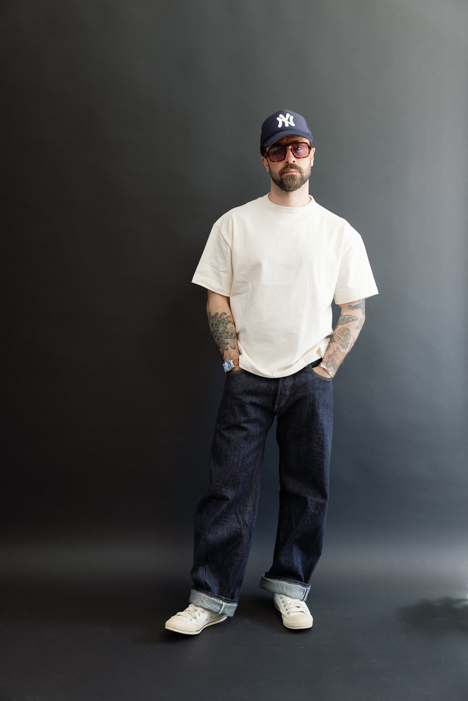 Full body front view of a male model, 5'9