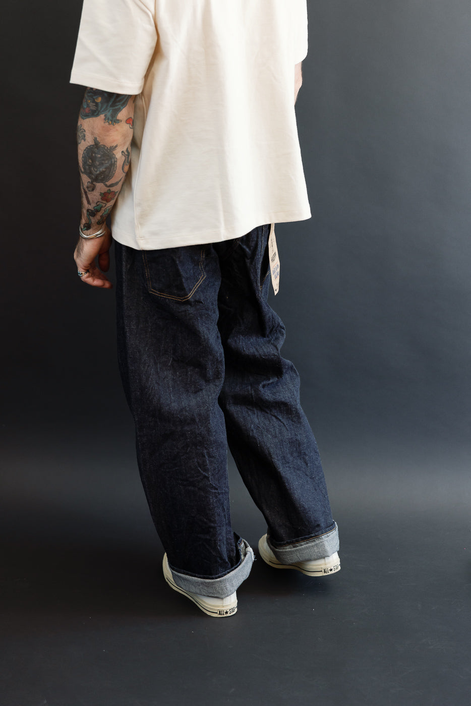 Full body back view of a male model, 5'9