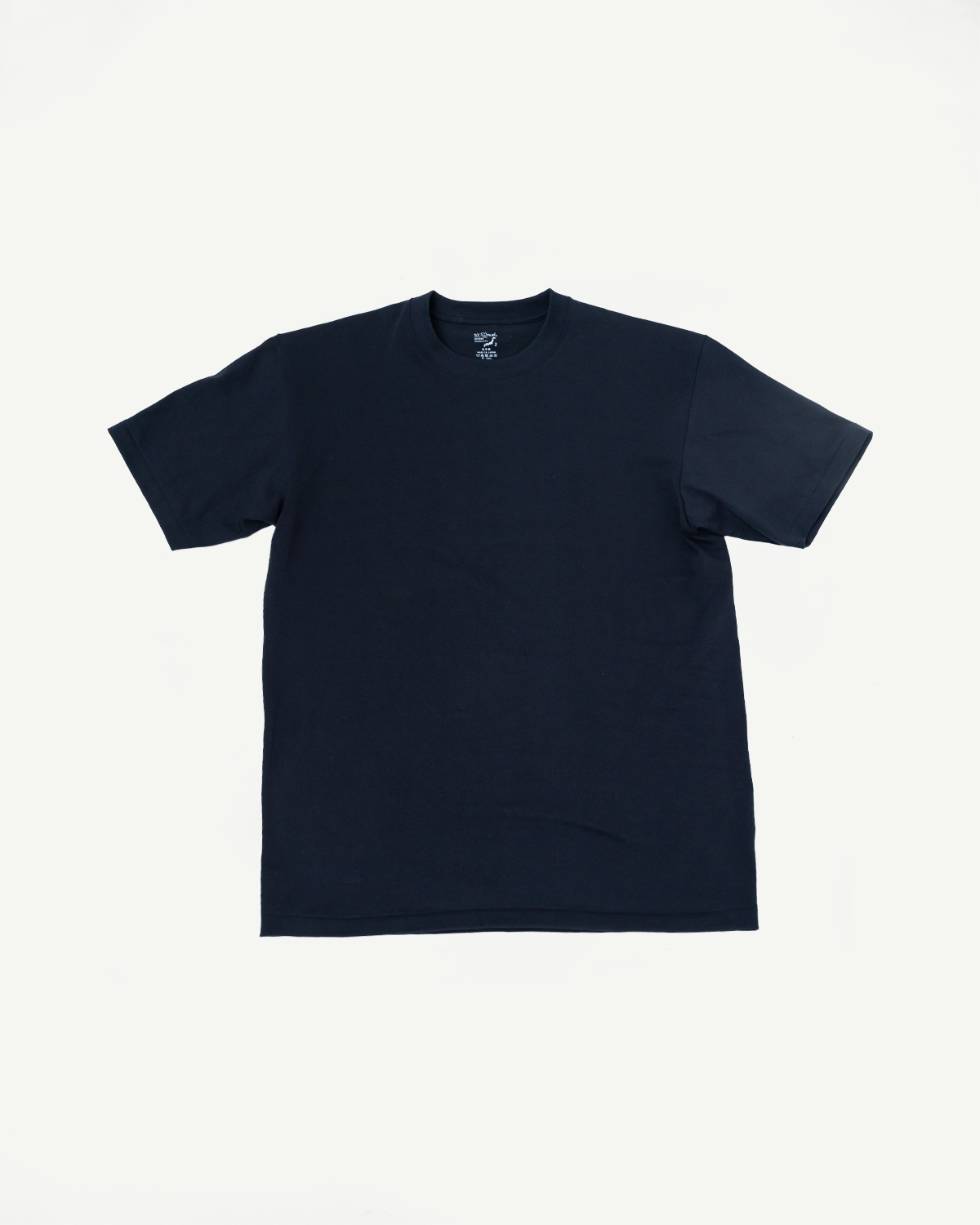 Flat lay front view of black short sleeve t-shirt, shows crew neck and straight hem.