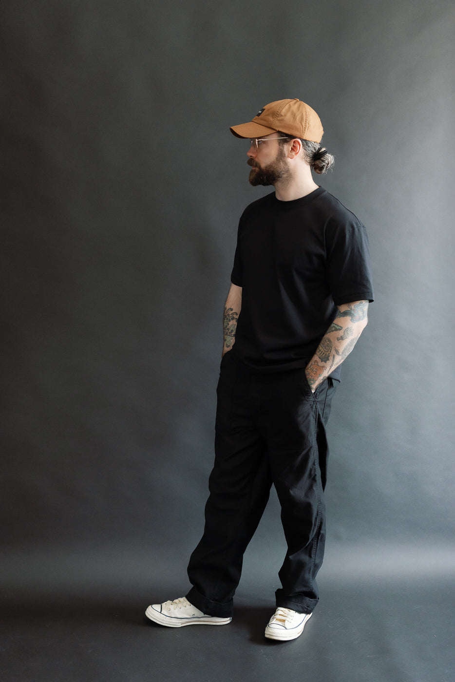 Full body side view of male model, 5'9