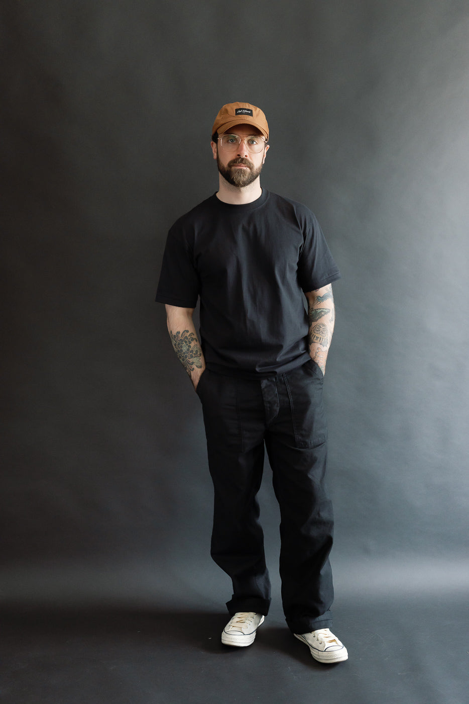 Full body front view of male model 5'9