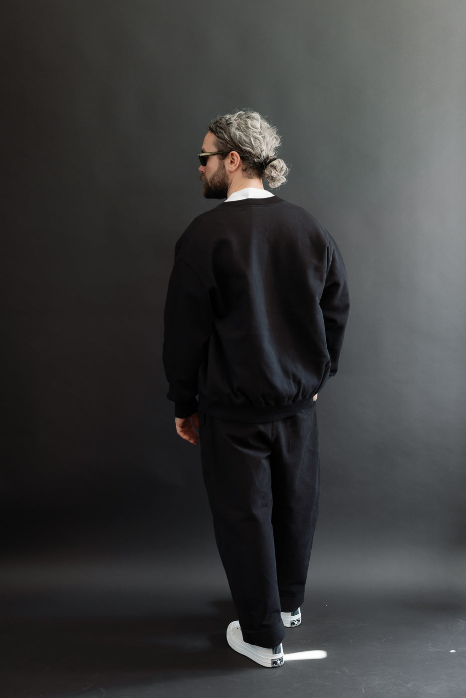Full body back view of a male model, 5'9